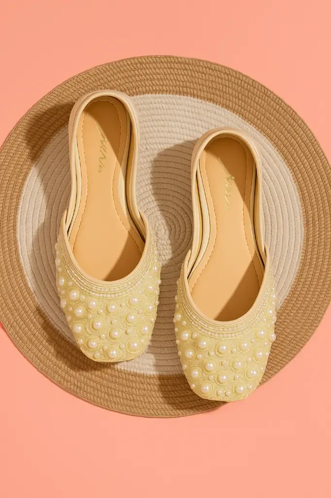 handcrafted pearl juttis flatlay fashion accessories